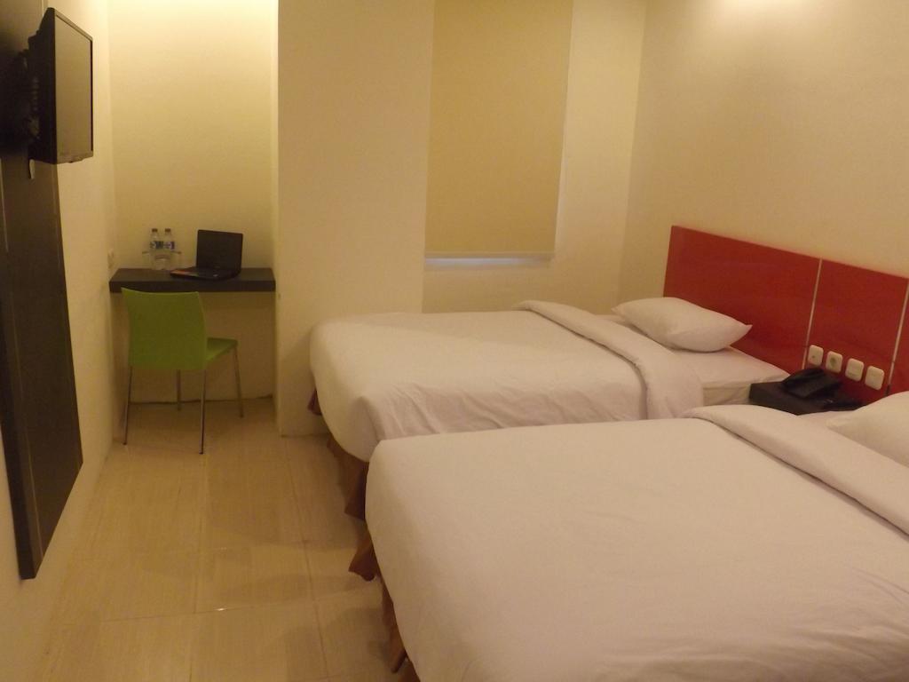 Quin Centro Hotel Palembang Exterior foto