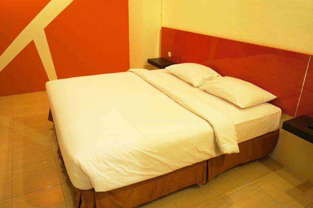 Quin Centro Hotel Palembang Zimmer foto