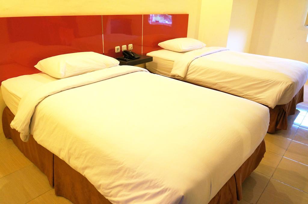 Quin Centro Hotel Palembang Zimmer foto